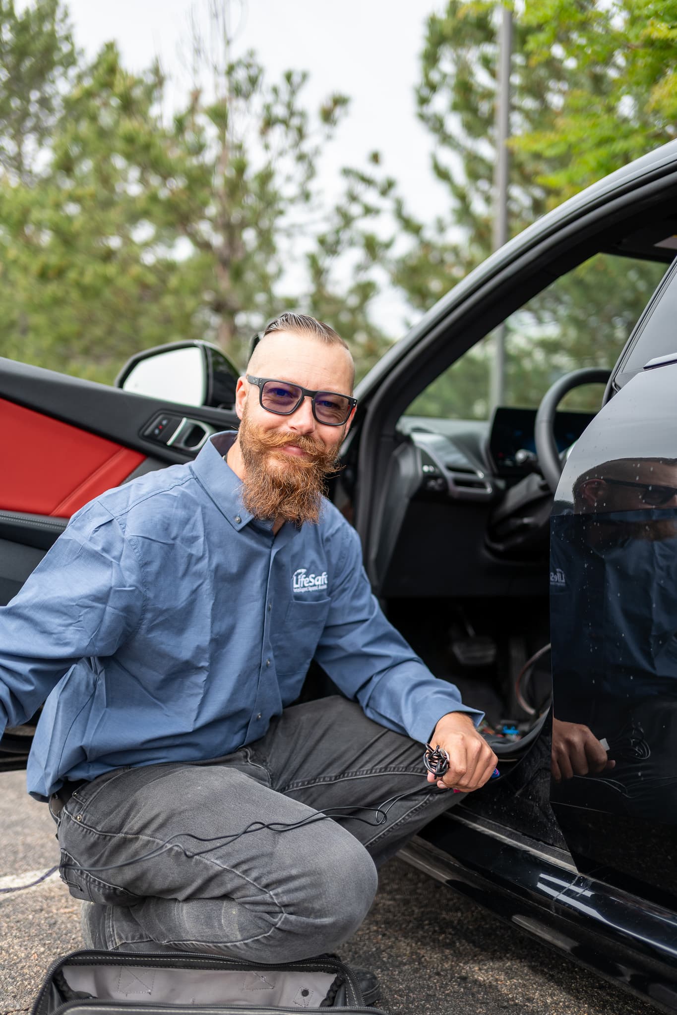 LifeSafer technician installing ISA device to car
